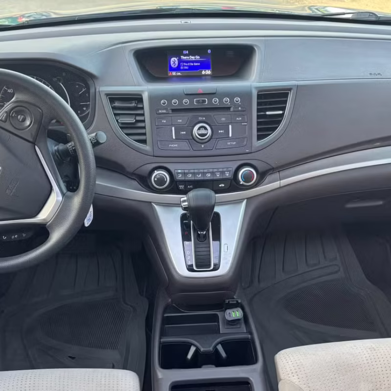 Dashboard and interior view of Honda CR-V 2014 rental car in Baton Rouge