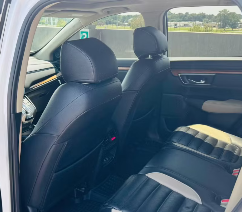 Rear seat view of Honda CR-V 2021 rental car showing back seat space in Baton Rouge