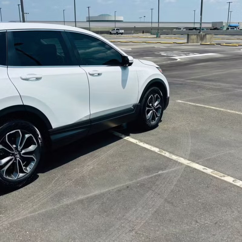 Side profile of Honda CR-V 2021 rental car parked in Baton Rouge