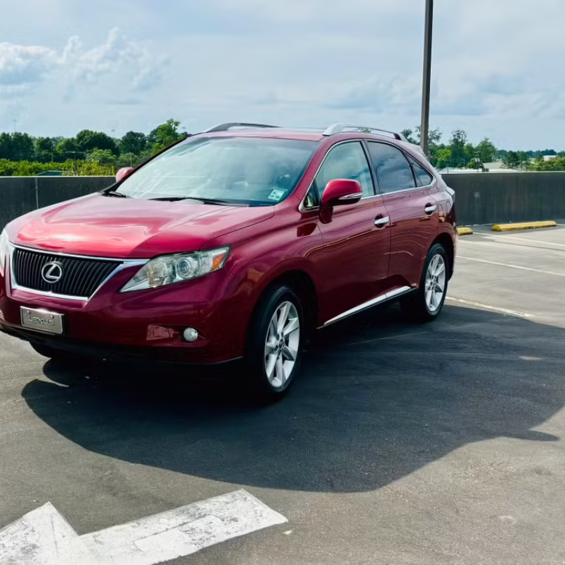 Side angle view of Lexus RX 2012 rental car available in Baton Rouge
