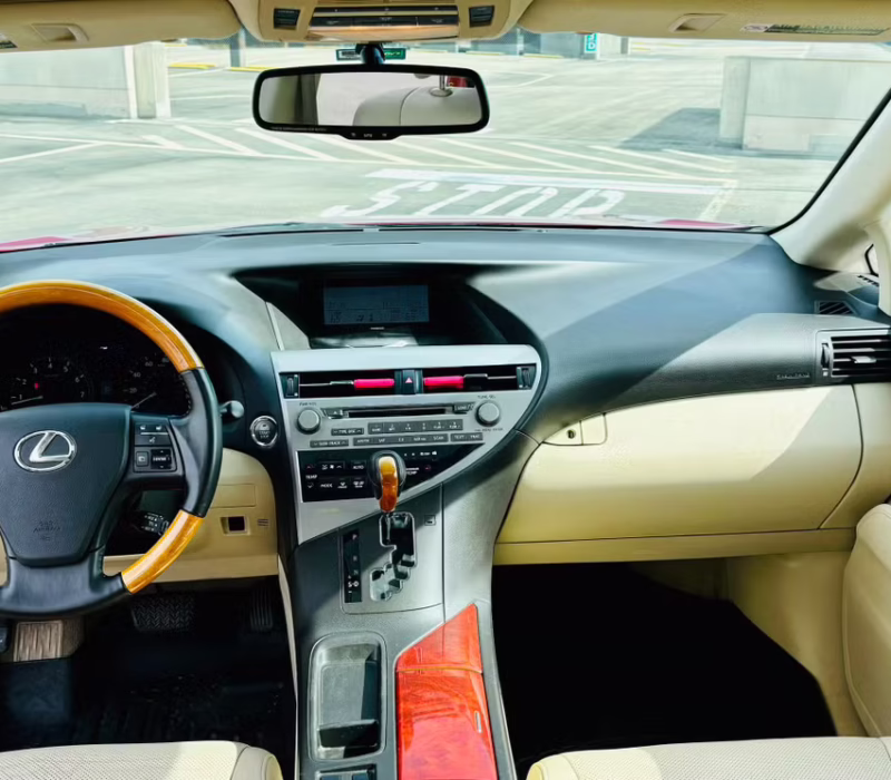 Alternate dashboard and console view of Lexus RX 2012 rental car in Baton Rouge