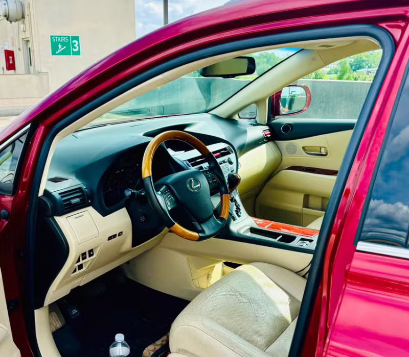 Front seat view of Lexus RX 2012 rental car parked in Baton Rouge
